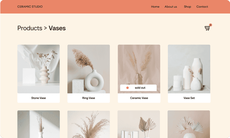 Website page displaying ceramic vases, including stone, ring, ceramic (sold out), and vase set, with a minimalist design.